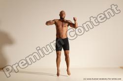 Underwear Gymnastic poses Man Black Muscular Bald Dancing Dynamic poses Academic